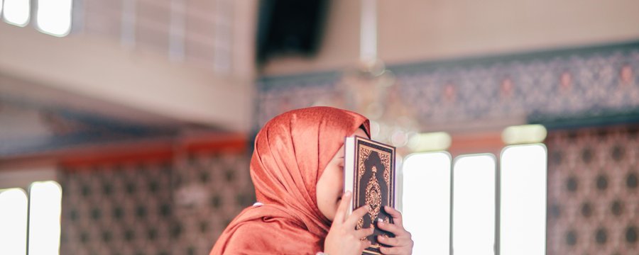 Girl reading Quran